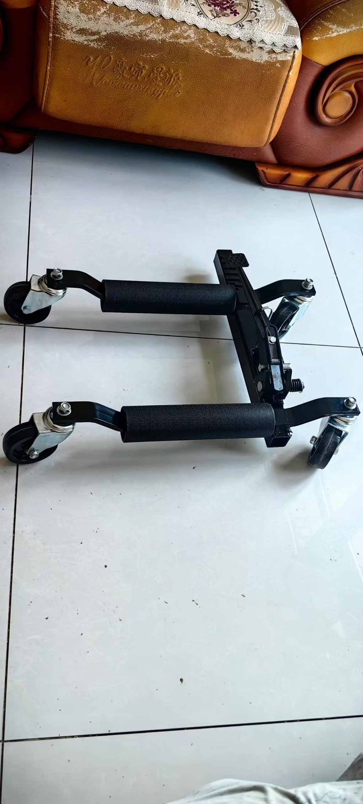 Black sample dolly showing roller span and support-arm arrangement