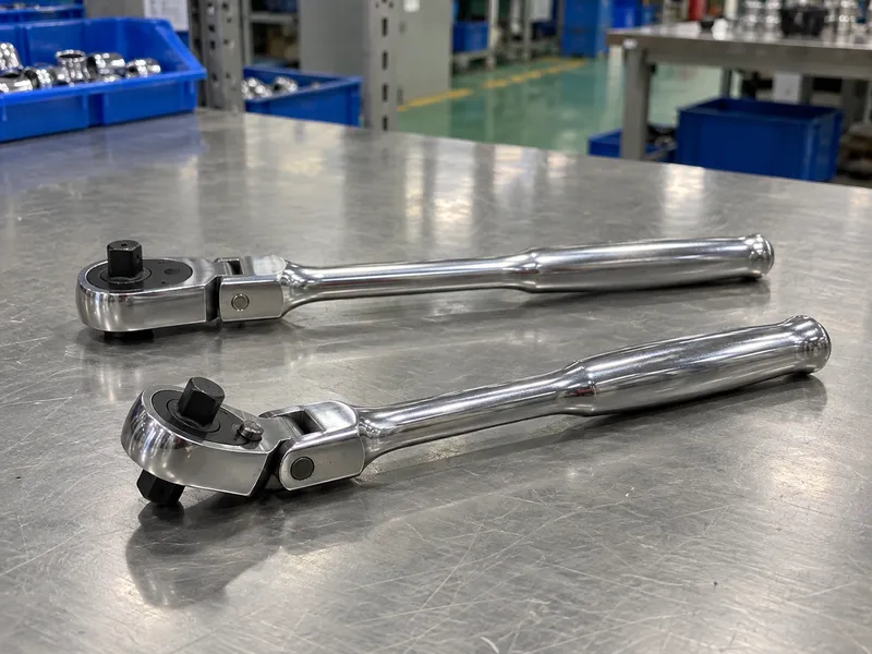 Two flex-head ratchets shown at different pivot positions
