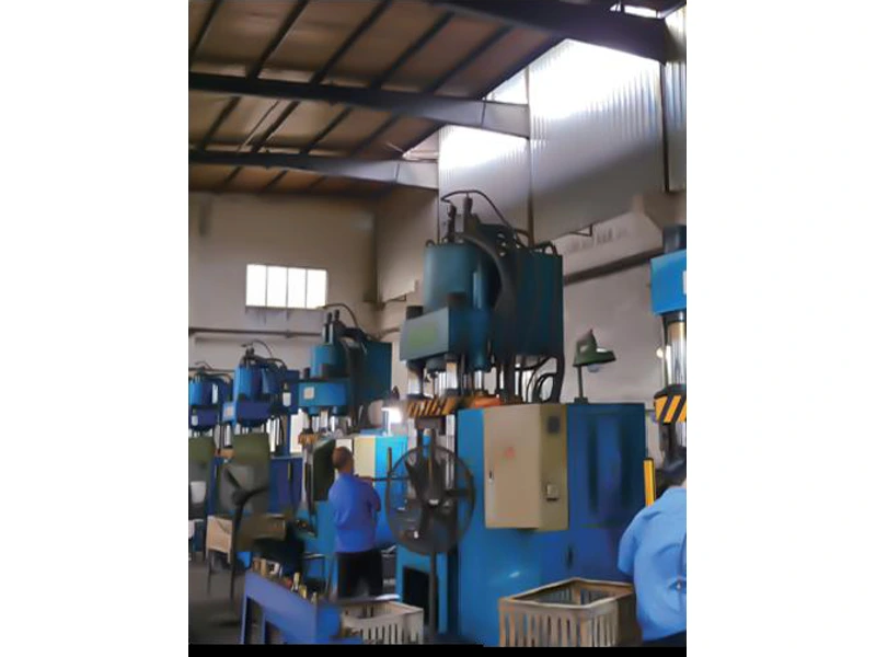 Cold-extrusion machinery in a workshop