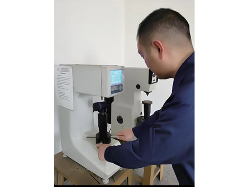 Operator using hardness-testing equipment