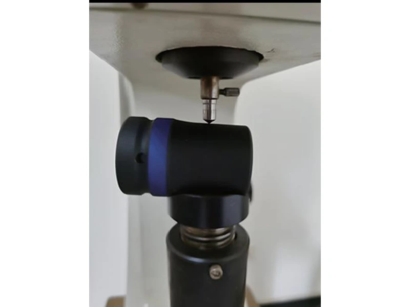 Socket positioned beneath a hardness tester